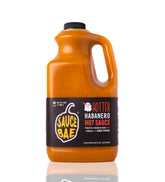 front view of Sauce Bae's Hotter Habanero 64 oz plastic hot sauce jug